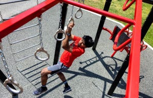 College student exercises outdoors at Haverford College