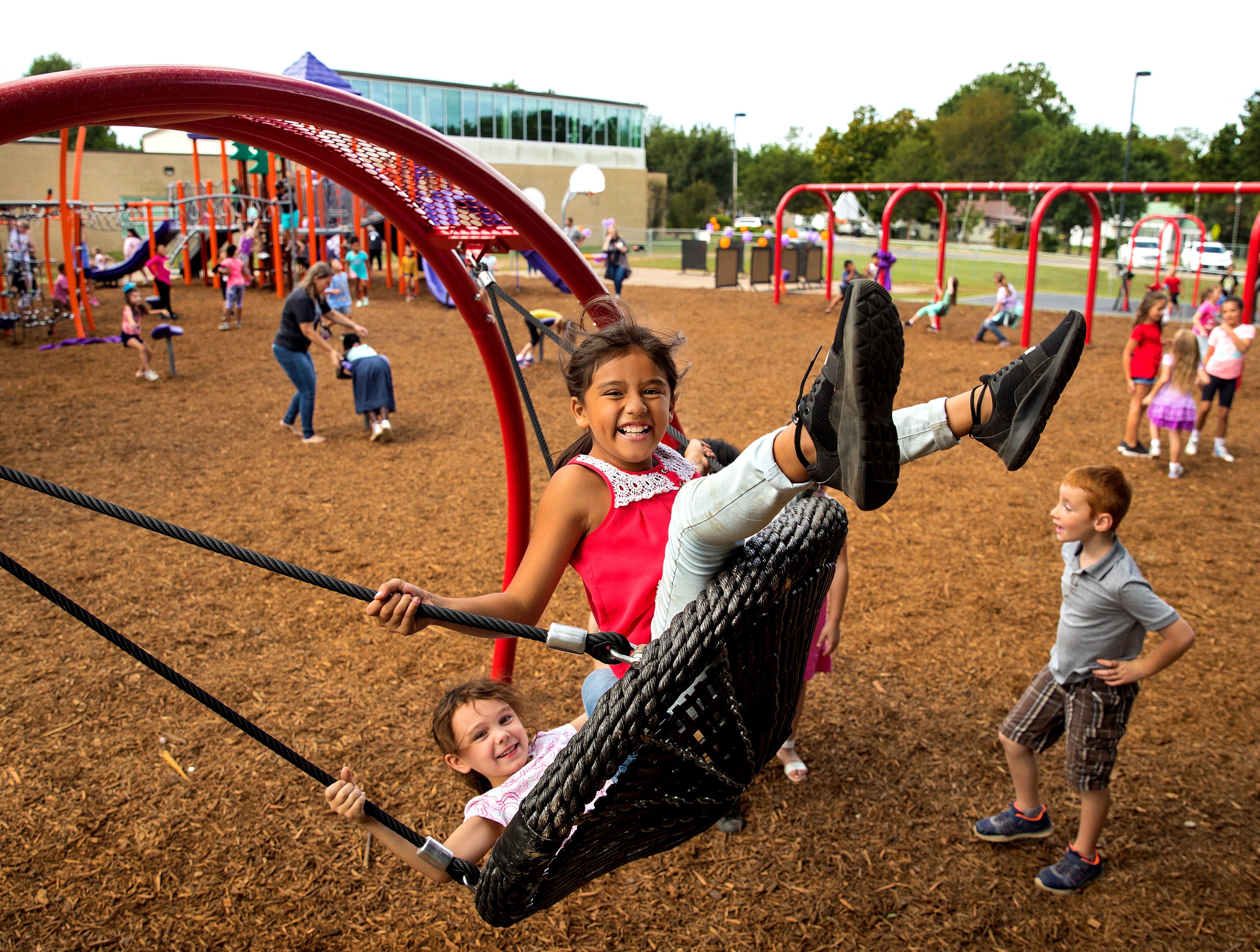 Child in playground swing