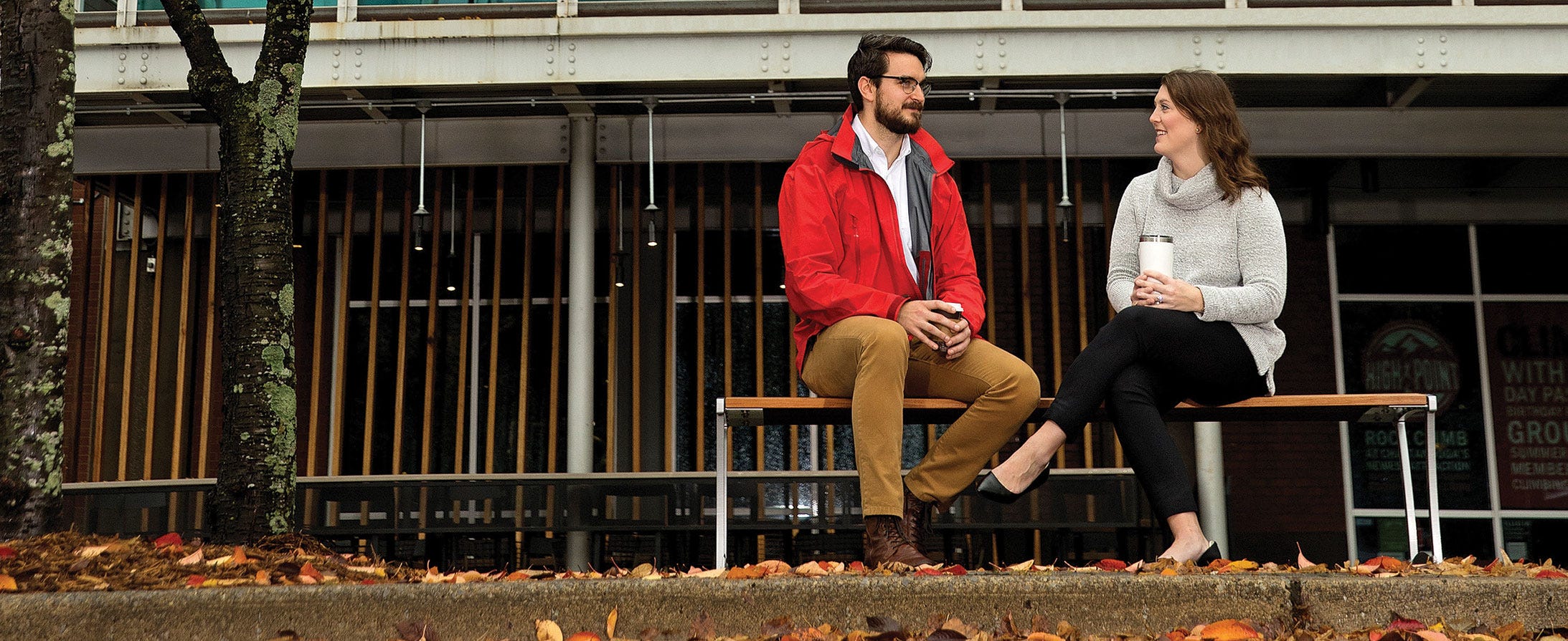 People sitting on a park bench