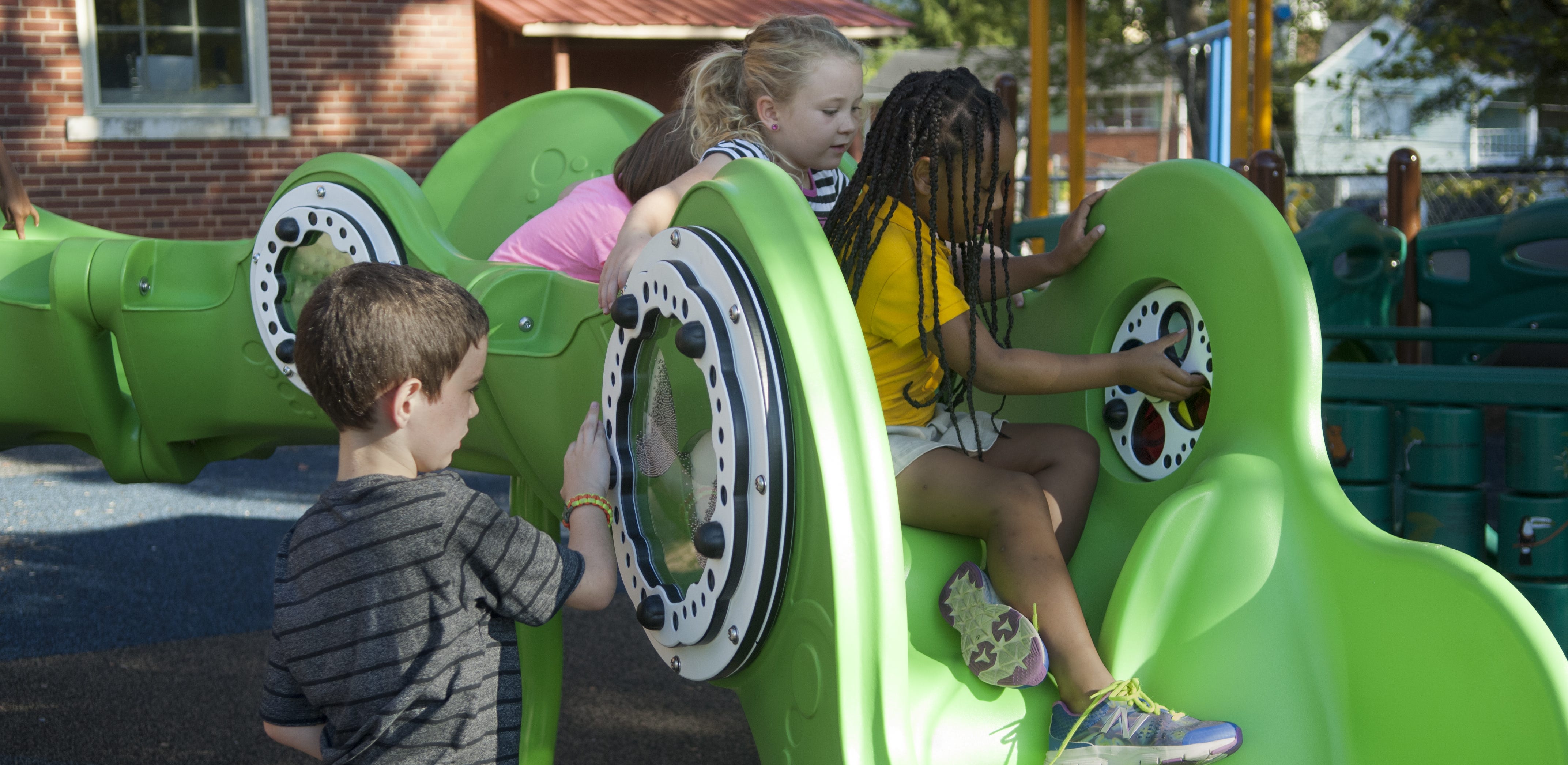 Sensory Wave Arch is an inclusive climber that encourages sensory play