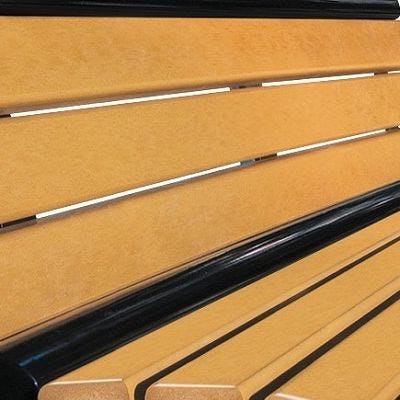 Recycled Plastic "Lumber" Bench Recycled plastic lumber slats on a Natual-looking bench
