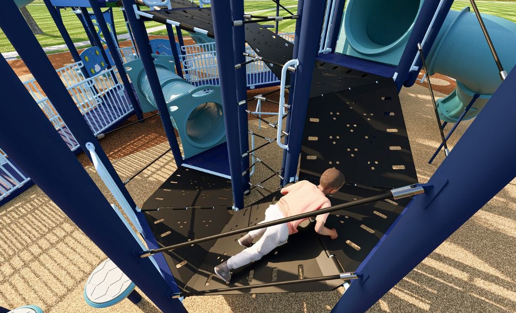 Blue, red, and yellow accessible play system with ramped access